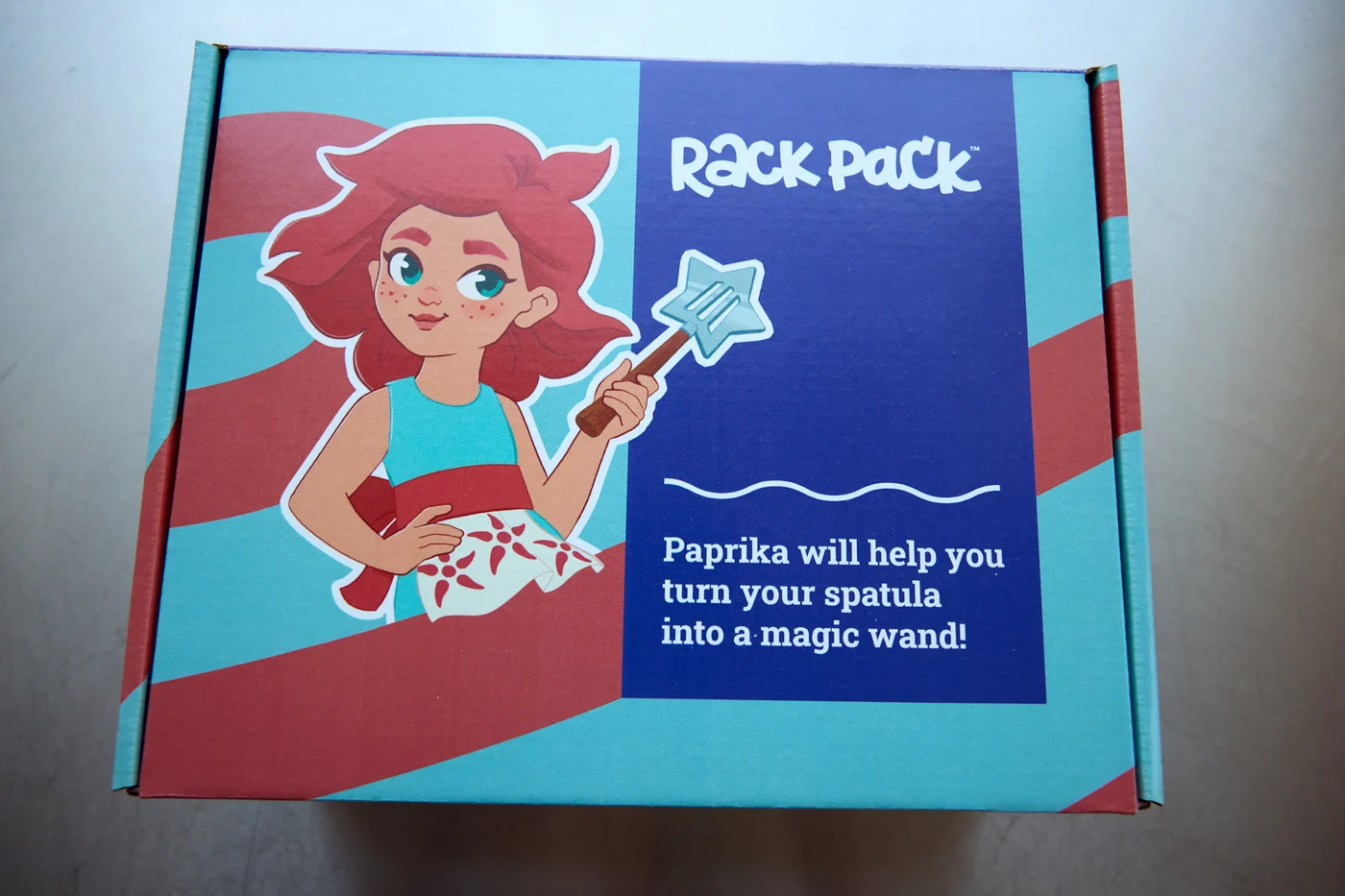 The closed Rack Pack Paprika Edition Kit box, with Paprika on the lid